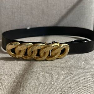 Vtg Mini Di N black patent with goldtone metal belt.